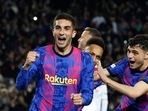 FC Barcelona's Ferran Torres celebrates scoring their first goal with Pedri and Pierre-Emerick Aubameyang.
