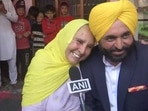 AAP's chief ministerial candidate Bhagwant Mann with his mother Harpal Kaur. (ANI Photo)