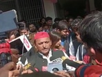 Samajwadi Party chief Akhilesh Yadav speaks to reporters after casting his vote at booth number 239 of Saifai village of Jaswant Nagar seat.(HT Photo)