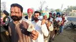 Voters standing in queue to cast their votes outside the government school in Bathinda district’s Naruana village on Sunday morning. (Sanjeev Kumar/HT) Voters standing in queue to cast their votes outside the government school in Bathinda district’s Naruana village on Sunday morning. (Sanjeev Kumar/HT)