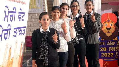 Young voters show their inked fingers after casting their ballot at a polling booth in Punjab on Sunday. (ANI PHOTO) Young voters show their inked fingers after casting their ballot at a polling booth in Punjab on Sunday. (ANI PHOTO)