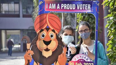 Voters after casting their vote at a model polling station during the Punjab assembly election in Ludhiana. (Gurpreet S/HT Photo)