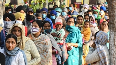 Voters queue up to cast their ballot at a polling station in a village on the outskirts of Amritsar. (Photo by NARINDER NANU / AFP) Voters queue up to cast their ballot at a polling station in a village on the outskirts of Amritsar. (Photo by NARINDER NANU / AFP)