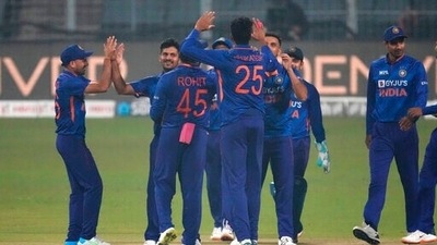 India's Shardul Thakur, second left, celebrates with teammates the dismissal of West Indies' Rovman Powell during the third Twenty20 international cricket match between India and West Indies in Kolkata, (AP) India's Shardul Thakur, second left, celebrates with teammates the dismissal of West Indies' Rovman Powell during the third Twenty20 international cricket match between India and West Indies in Kolkata, (AP)