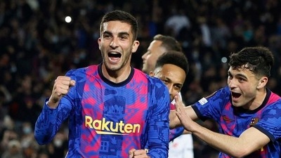FC Barcelona's Ferran Torres celebrates scoring their first goal with Pedri and Pierre-Emerick Aubameyang. (REUTERS)