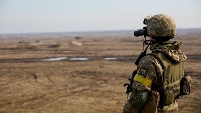 A service member of the Ukrainian armed forces takes part in tactical military exercises at a training ground in the Rivne region, Ukraine. (Reuters)