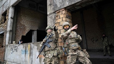 The Ukrainian Territorial Defence Forces, the military reserve of the Ukrainian Armed Forces, take part in a military drill outside Kyiv. (AFP) The Ukrainian Territorial Defence Forces, the military reserve of the Ukrainian Armed Forces, take part in a military drill outside Kyiv. (AFP)