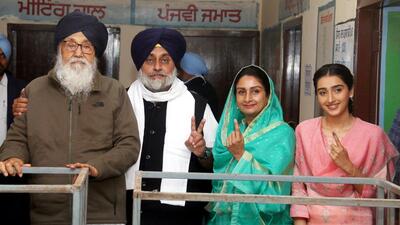 Former Punjab CM Parkash Singh Badal, Shiromani Akali Dal president Sukhbir Singh Badal and Bathinda MP Harsimrat Kaur Badal after casting their votes at Badal village in Muktsar’s Lambi assembly segment on Sunday. (Sanjeev Kumar/HT)