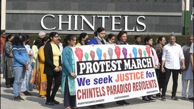 Gurugram, India - February 20: Residents of Chintels Paradiso Housing Complex participate in a protest march demanding CBI probe in the multiple roof collapse in the residential complex, at Sector 109, in Gurugram, India, on Sunday, February 20, 2022. (Photo by Parveen Kumar/Hindustan Times) Gurugram, India - February 20: Residents of Chintels Paradiso Housing Complex participate in a protest march demanding CBI probe in the multiple roof collapse in the residential complex, at Sector 109, in Gurugram, India, on Sunday, February 20, 2022. (Photo by Parveen Kumar/Hindustan Times)
