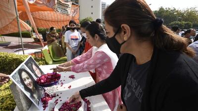 Gurugram, India - February 20: Residents pay homage to Ekta Bhardwaj and Sunita Shrivastava, who died in the multiple roof collapsein Chintels Paradiso Housing Complex, Sector 109, in Gurugram, India, on Sunday, February 20, 2022. (Photo by Parveen Kumar/Hindustan Times) Gurugram, India - February 20: Residents pay homage to Ekta Bhardwaj and Sunita Shrivastava, who died in the multiple roof collapsein Chintels Paradiso Housing Complex, Sector 109, in Gurugram, India, on Sunday, February 20, 2022. (Photo by Parveen Kumar/Hindustan Times)
