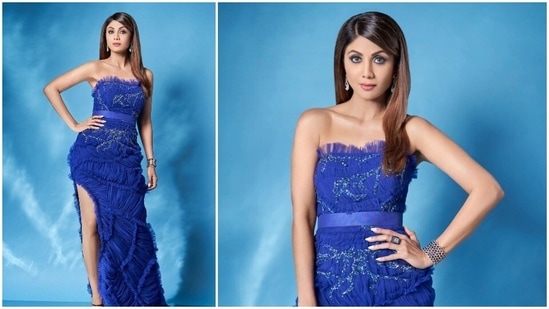 Shilpa Shetty often wears show-stopping outfits from famous international designers to judge shows and attend events. In her latest Instagram stills, the actor can be seen looking gorgeous in a cobalt blue thigh-high slit strapless dress.(Instagram/@theshilpashetty)
