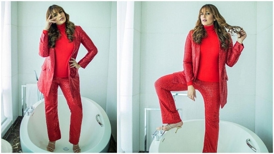 Huma Qureshi is busking on the success of her latest release Mithya, a thriller OTT series. She is now promoting her upcoming film Valimai. For a recent promotional event in Hyderabad, the actor went all red and donned a sequins pantsuit.(Instagram/@iamhumaq)