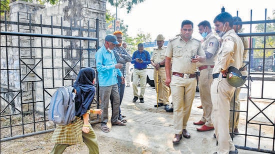Previously, several colleges in Karnataka denied entry to the students despite the high court order that had directed that no religious attire will be allowed inside the classrooms until the hearing on the matter concludes. (PTI)