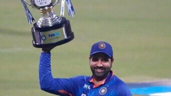 India's captain Rohit Sharma holds the winners trophy after their win in the third Twenty20 international cricket match against West Indies in Kolkata, India, Sunday, Feb. 20, 2022. Indian won the series 3-0.(AP)