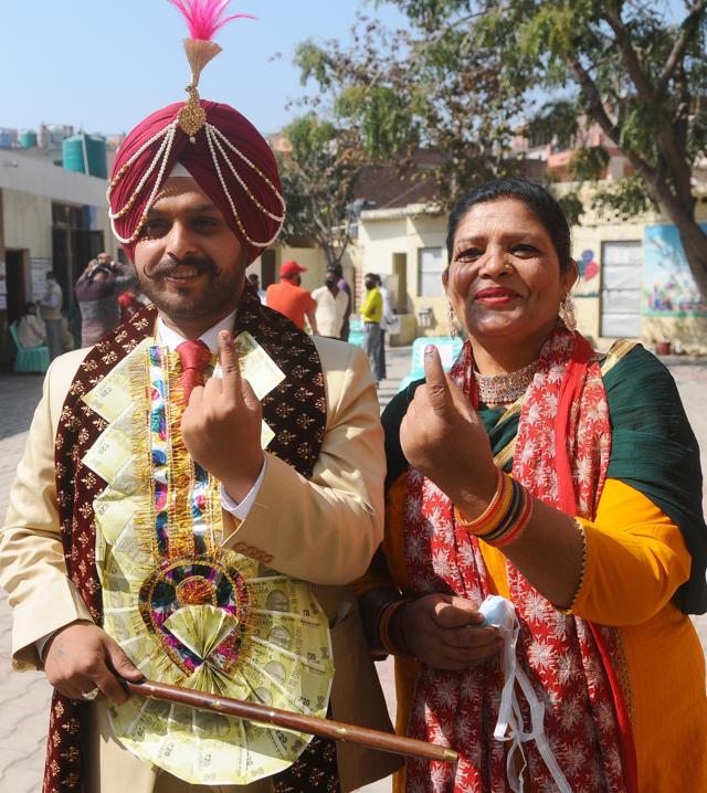 Jaspreet Singh cast his vote before proceeding for his wedding ceremony in Mohali. (Ravi Kumar/HT)
