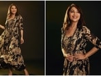 Madhuri Dixit is gearing up for the release of her OTT debut series The Fame Game which will release on February 25. The Kalank actor recently promoted her show wearing a stunning black printed jumpsuit set by Astha Narang.(Instagram/@mohitvaru)