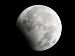 The moon is seen during a partial lunar eclipse in Shanghai January 1, 2010.&nbsp;