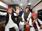 Samajwadi Party Akhilesh Yadav (L), party founder Mulayam Singh Yadav (R) and his brother Shivpal Yadav, campaign for election