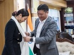 Arunachal Pradesh CM Pema Khandu felicitates actor Chum Darang. Arunachal Pradesh CM Pema Khandu felicitates actor Chum Darang.
