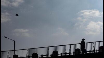 A man stands on Sambhaji bridge (Lakdi Pul) on a partly cloudy evening in Pune, on Saturday. With the current La Nina conditions prevailing, the southwest monsoon this year is likely to be normal as per weather scientists. (Pratham Gokhale/HT Photo) A man stands on Sambhaji bridge (Lakdi Pul) on a partly cloudy evening in Pune, on Saturday. With the current La Nina conditions prevailing, the southwest monsoon this year is likely to be normal as per weather scientists. (Pratham Gokhale/HT Photo)