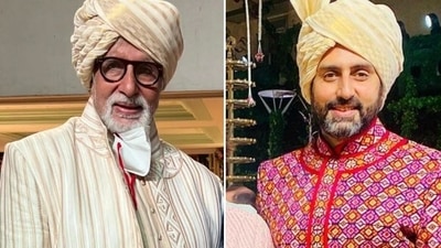 Amitabh Bachchan and Abhishek Bachchan at Anmol Ambani's wedding.