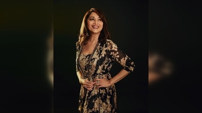 It comes with a matching cape and a shimmery ivory belt. Madhuri Dixit teamed her look with transparent stilettoes. (Instagram/@mohitvaru) It comes with a matching cape and a shimmery ivory belt. Madhuri Dixit teamed her look with transparent stilettoes. (Instagram/@mohitvaru)