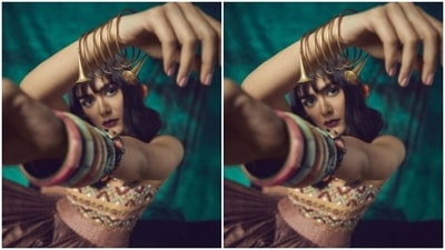 In multicolour bangles and a golden bracelet, Mrunal added more desi sass to her look with marigold stuck to her hair. (Instagram/@mrunalthakur)