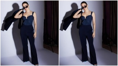 In another, Sanya Malhotra can be seen giving major boss lady vibes as she posed in a black pantsuit teamed with with a bodysuit. (Instagram/@sanyamalhotra_)