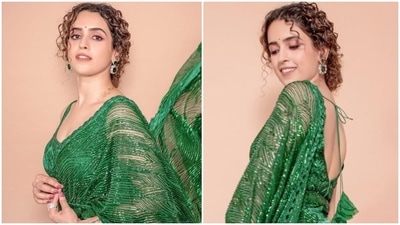 In an earlier post, Sanya Malhotra dazzled in an emerald lehenga saree teamed with a backless sleeveless blouse. (Instagram/@sanyamalhotra_)