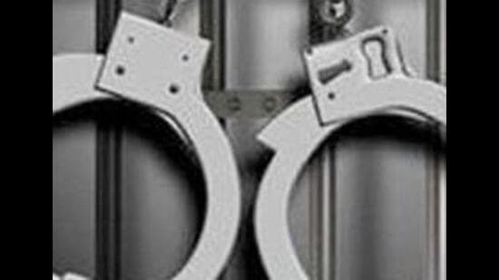Police recovered 58 boxes, containing 631 bottles of liquor, hidden behind boxes of medicines.