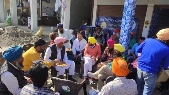 AAP’s Dirba candidate Harpal Singh Cheema with party workers. (HT Photo) AAP’s Dirba candidate Harpal Singh Cheema with party workers. (HT Photo)
