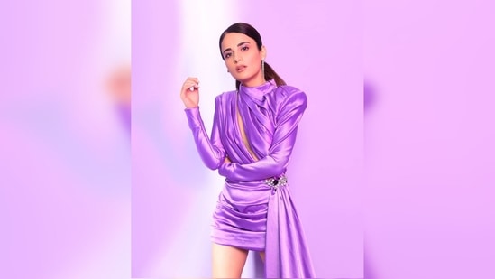 Radhika Madan bagged her first Filmfare award in 2021. She made headlines for the violet pleated dress she wore to the event night.(Instagram/@radhikamadan)