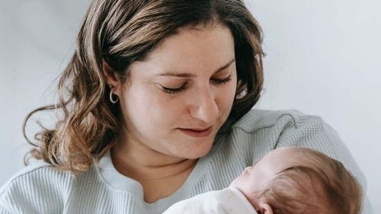 In case of normal delivery, patients tend to sit with a slouch posture because of the stitches. In such cases, they can use a pillow to sit straight.(Pexels)