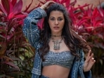 Move over snug and stylish this season and take a crash course on sultry fashion from Bollywood actor Amyra Dastur who sizzled the glam quotient in an indigo sartorial pantsuit teamed with a matching bling bralette. (Instagram/amyradastur93)