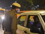 Delhi Police personnel manning at a checkpost after the Delhi government imposed night curfew in wake of rising Covid-19 cases. (Amal KS/HT Photo) Delhi Police personnel manning at a checkpost after the Delhi government imposed night curfew in wake of rising Covid-19 cases. (Amal KS/HT Photo)