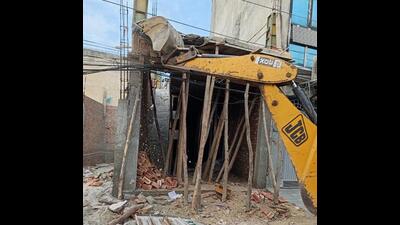 Ludhiana MC teams demolishing illegal commercial constructions in different parts of the city on Tuesday. (HT Photo) Ludhiana MC teams demolishing illegal commercial constructions in different parts of the city on Tuesday. (HT Photo)
