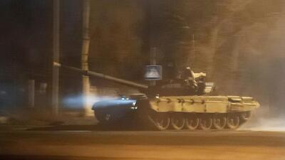 A tank drives along a street after Russian President Vladimir Putin ordered the deployment of Russian troops to two breakaway regions in eastern Ukraine following the recognition of their independence, in the separatist-controlled city of Donetsk, Ukraine on Tuesday. (REUTERS) A tank drives along a street after Russian President Vladimir Putin ordered the deployment of Russian troops to two breakaway regions in eastern Ukraine following the recognition of their independence, in the separatist-controlled city of Donetsk, Ukraine on Tuesday. (REUTERS)