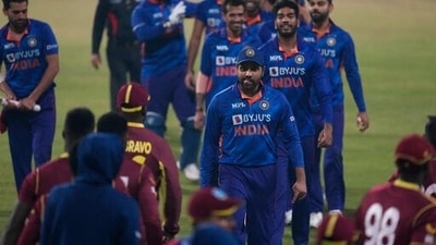 India's captain Rohit Sharma, center, gestures as he and teammates walk off the field after their win in the second Twenty20 international cricket match against West Indies in Kolkata,&nbsp; (AP)