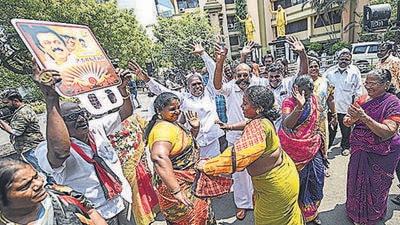 DMK party workers celebrate after the party's lead in the Tamil Nadu local body elections, at the party headquarters in Chennai on Tuesday. (PTI) DMK party workers celebrate after the party's lead in the Tamil Nadu local body elections, at the party headquarters in Chennai on Tuesday. (PTI)