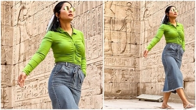 Hina opted for minimal jewels to style the day-out ensemble. She chose gold hoop earrings with pearl embellishments and hexagon-shaped retro sunglasses in a green tint. In the end, a sleeked back half-tied hairdo adorned with a multi-coloured scarf, nude lip shade, glowing skin, and rosy hint on the cheeks completed the glam picks. (Instagram/@realhinakhan) Hina opted for minimal jewels to style the day-out ensemble. She chose gold hoop earrings with pearl embellishments and hexagon-shaped retro sunglasses in a green tint. In the end, a sleeked back half-tied hairdo adorned with a multi-coloured scarf, nude lip shade, glowing skin, and rosy hint on the cheeks completed the glam picks. (Instagram/@realhinakhan)