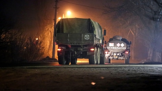 Military trucks move down a street outside Donetsk, the territory controlled by pro-Russian militants, eastern Ukraine. (AP)