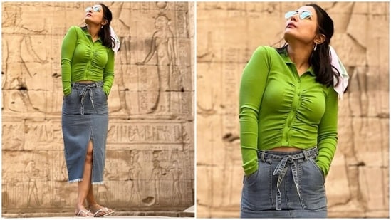 Hina wore the top with a high-waisted denim midi skirt featuring a tie on the waist, thigh-high slit on the front, ribbed hem and a figure-skimming silhouette. She rounded off the look by teaming her ensemble with strappy sandals.(Instagram/@realhinakhan)