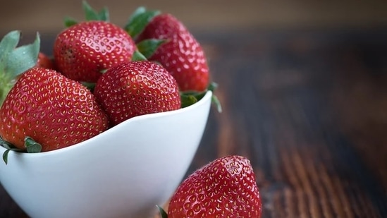 Loaded with vitamin c and fibre, strawberry is considered a cholesterol-free and low-calorie food having high levels of antioxidants. One bowl of strawberry provides 98 mg of vitamin C.(Pixabay)