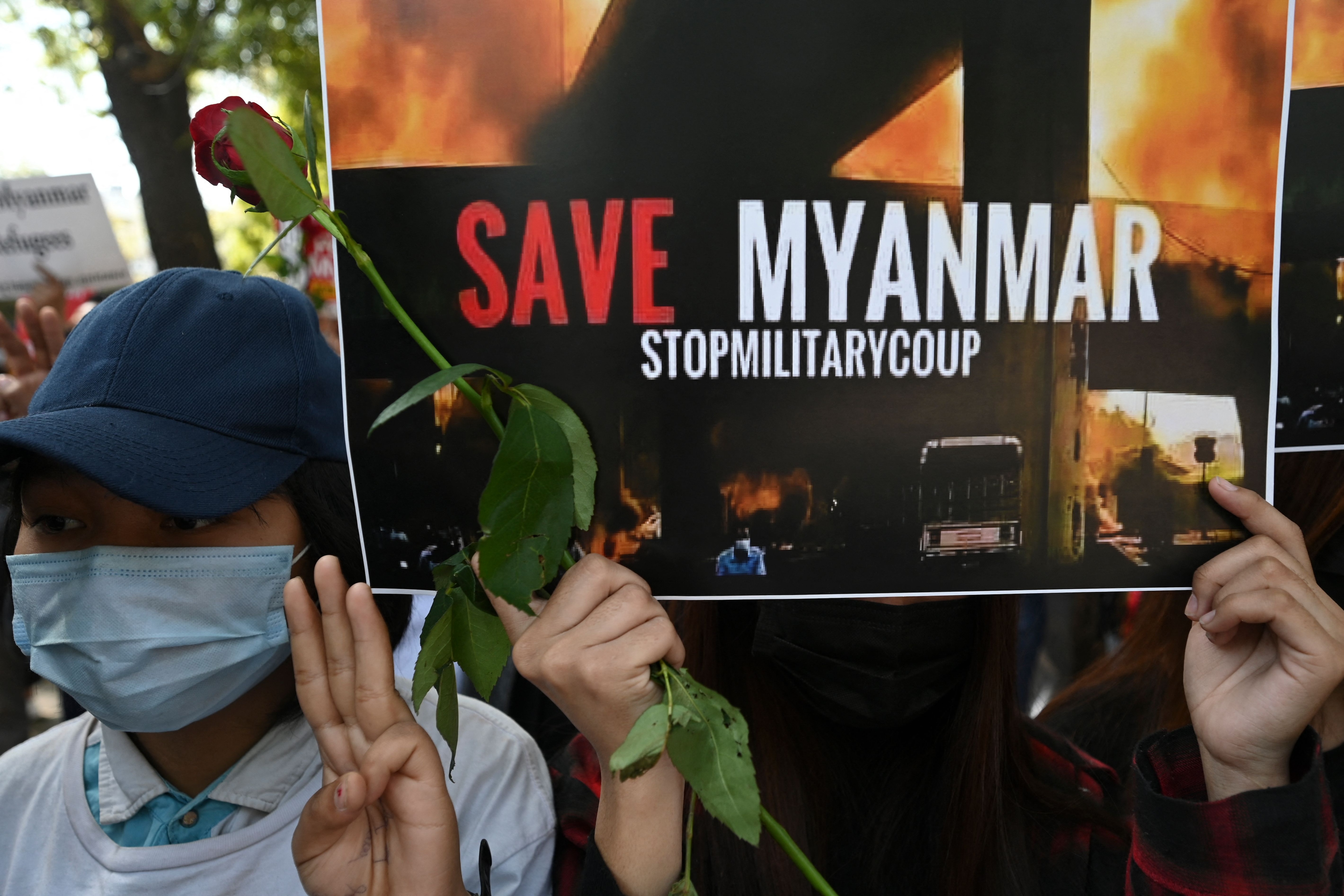 Pro-democracy supporters take part in a protest in New Delhi on February 22, 2022, against the military rule in Myanmar. (AFP) Pro-democracy supporters take part in a protest in New Delhi on February 22, 2022, against the military rule in Myanmar. (AFP)