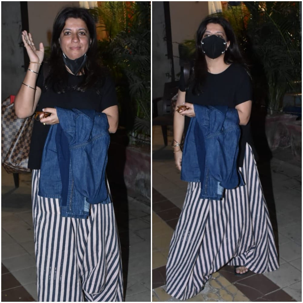 Zoya was spotted wearing a black T-shirt, striped trousers.