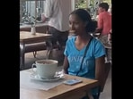 Screengrab from the prank video where a woman was served a huge cup of coffee. (instagram/@dritanalsela) Screengrab from the prank video where a woman was served a huge cup of coffee. (instagram/@dritanalsela)