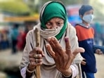 In her late 80's Mehrul Nisha came all the way from Laulai village to cast her franchise at the polling booth in Chinhat, Lucknow.(Photo by Oliver Fredrick, Hindustan Times)
