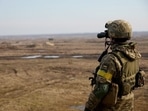 A service member of the Ukrainian armed forces takes part in tactical military exercises at a training ground in the Rivne region, Ukraine.
