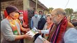 Union home minister Amit Shah during a door to door campaign for assembly polls, in Churachandpur (Manipur) on Wednesday. (PTI) Union home minister Amit Shah during a door to door campaign for assembly polls, in Churachandpur (Manipur) on Wednesday. (PTI)