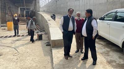 Mayor Balkar Singh Sandhu and MC Pardeep Sabharwal inspecting the Pakhowal Road RUB on Wednesday. (HT PHOTO)